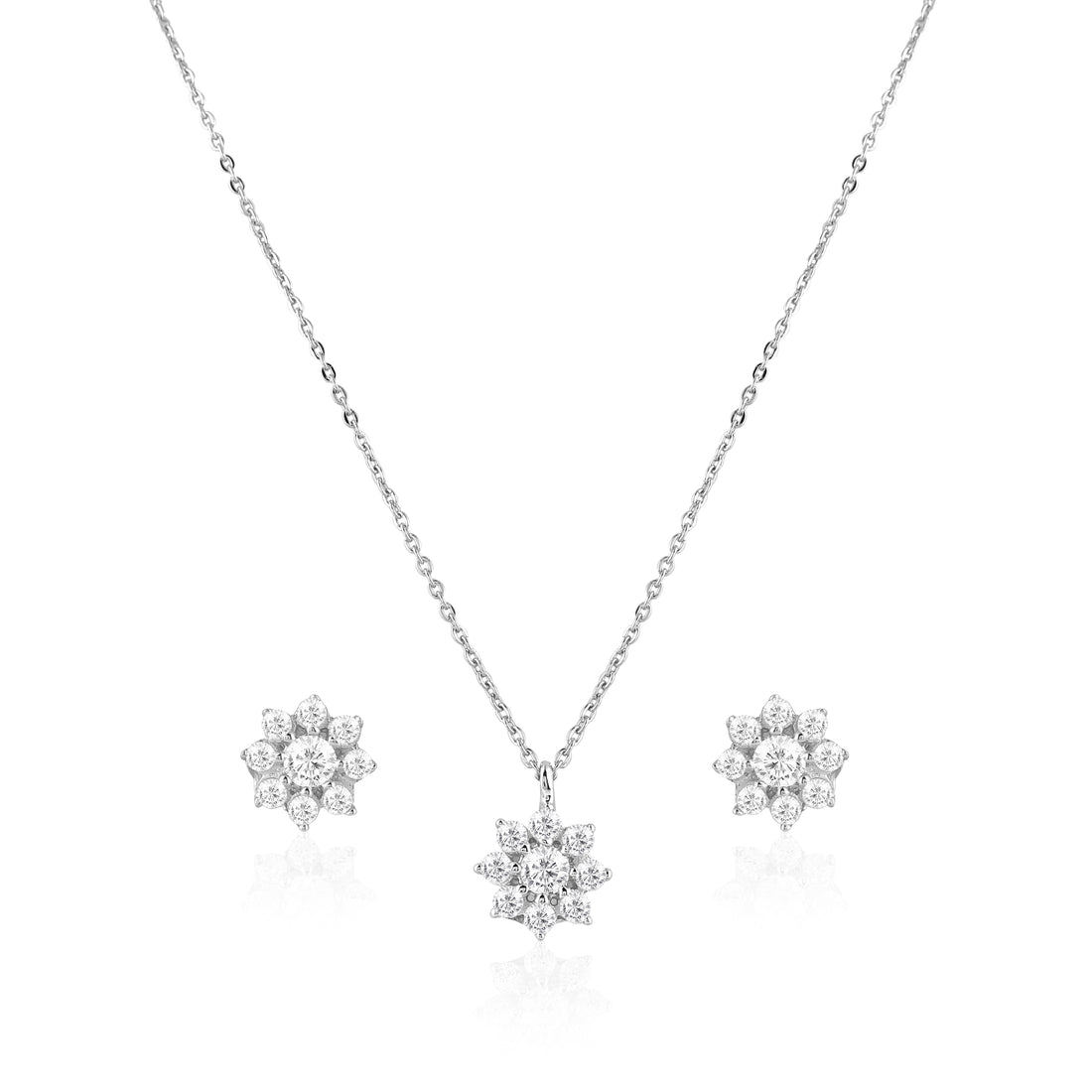 Floral 925 silver pendant and earrings styled on soft pink background