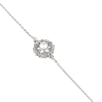 Close-up of 925 silver pearl flower bracelet with marquise halo