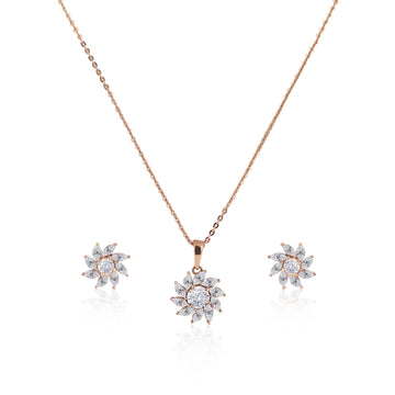 Front view of 925 sterling silver floral bloom pendant necklace with matching stud earrings and sparkling CZ stones