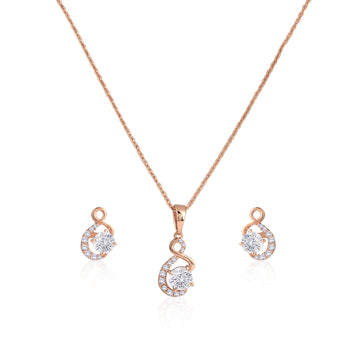 Front view of 925 sterling silver teardrop pendant necklace with matching drop earrings and cubic zirconia accents