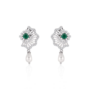 Close-up of 925 silver green stone earrings with cubic zirconia halo and pearl drop detailing