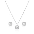 925 silver cushion halo pendant set with zircon stones displayed on blue fabric background