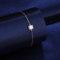 925 silver square emerald-cut bracelet styled on dark blue background