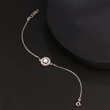 Pearl flower 925 silver bracelet styled on black background