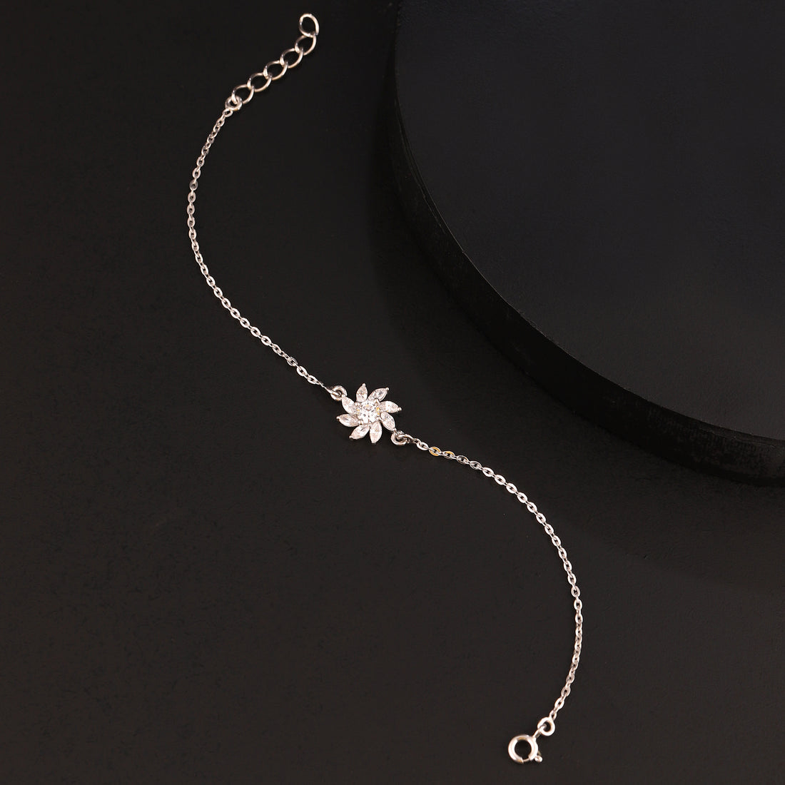 Floral 925 silver bracelet displayed on dark background