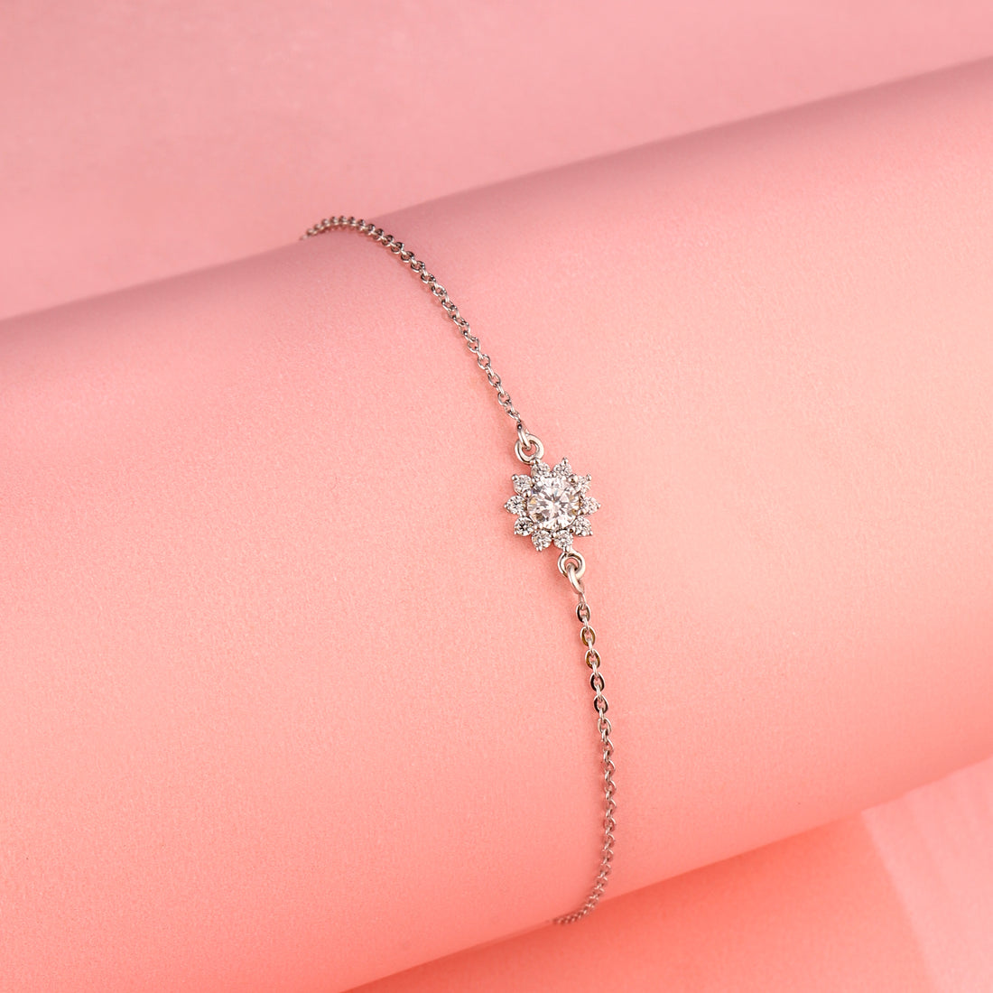 Sunflower 925 silver bracelet displayed on pink background