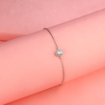 925 silver halo bracelet worn on pink background