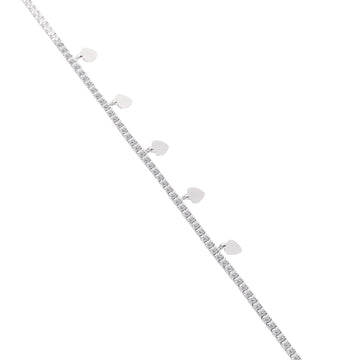 Top view of 925 silver tennis bracelet with dangling polished heart charms