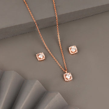 Rose gold cushion halo pendant set in 925 silver with sparkling stones on grey background