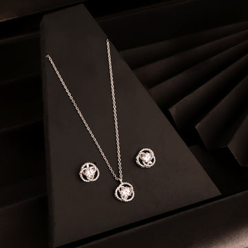 925 silver classic halo pendant necklace set with matching stud earrings displayed on black background