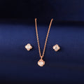 Rose gold 925 silver cushion halo pendant set displayed on blue fabric background