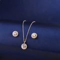 925 silver double halo pendant set with zircon stones displayed on blue fabric