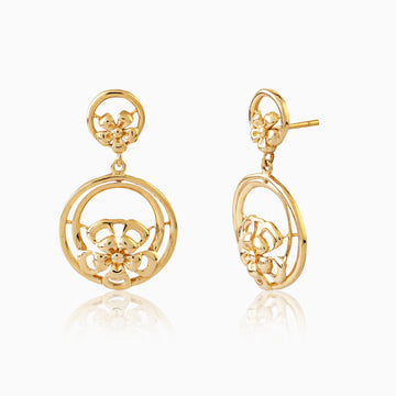 Front view of 925 silver golden floral circle drop earrings highlighting intricate bloom design and round frame