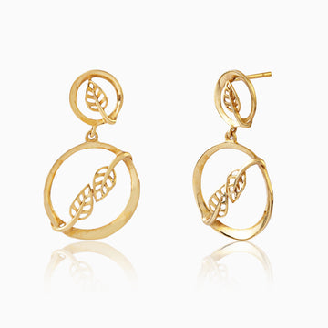 Front view of 925 silver gold-polish circle drop earrings featuring detailed leaf design within round frame