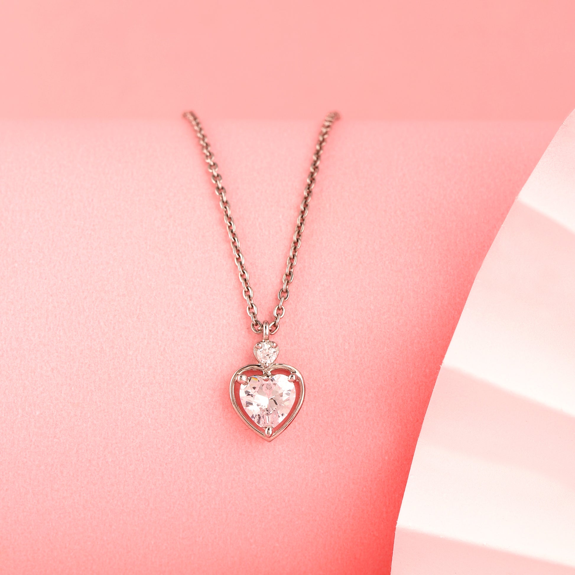 Classic heart-cut 925 silver pendant with polished open frame design