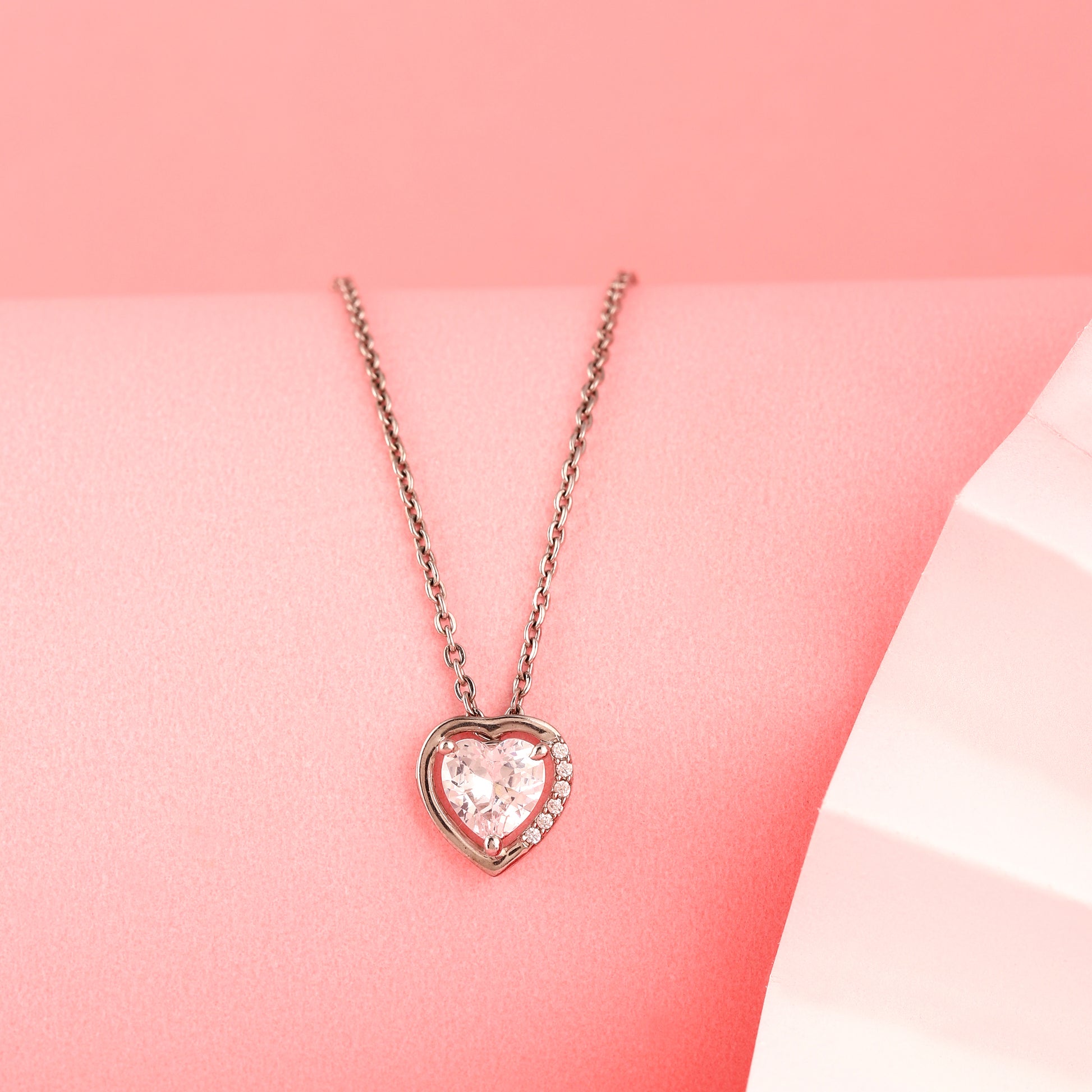 Polished 925 silver heart necklace with inner heart-cut stone detail