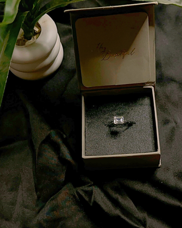 East-West Emerald Solitaire Ring